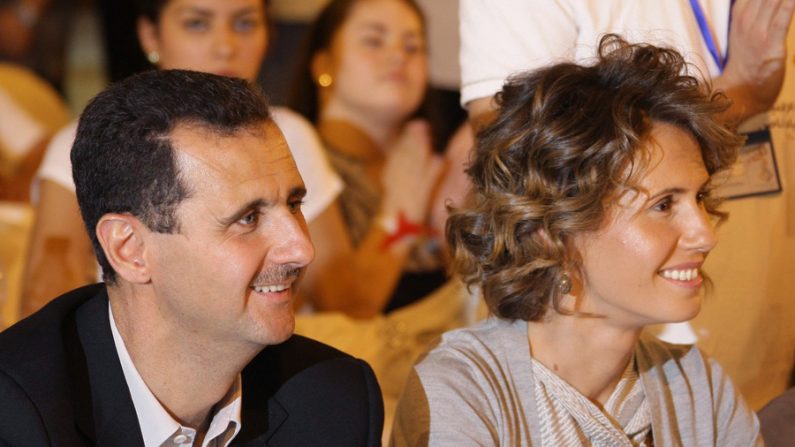 O líder sírio, Bashar al-Assad e sua esposa, Asma (Louai Beshara / AFP / Getty Images)