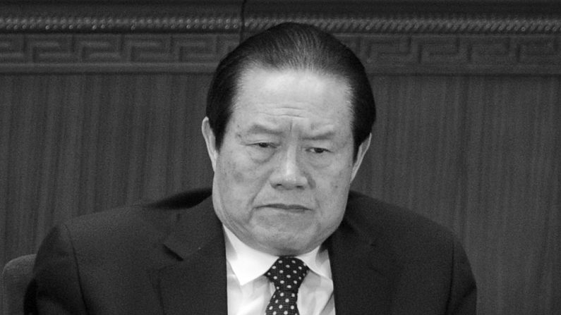 Zhou Yongkang, o ex-chefe da segurança interna do regime chinês, é retratado no Congresso Popular Nacional em 5 de março de 2012. O anúncio de 2 de julho de 2014 sobre três dos ex-secretários de Zhou terem sido expulsos do Partido Comunista Chinês é mais um sinal de que o próprio Zhou é também um alvo (Liu Jin/AFP/Getty Images)