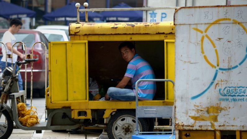 O investimento estrangeiro direto na China baixou mais de um sexto ano-a-ano em julho, informou o governo, em 18 de agosto (Wang Zhao/AFP/Getty Images)