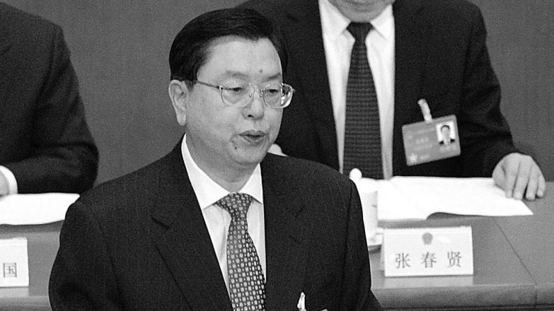 Zhang Dejiang, presidente do Comitê Permanente do Congresso Popular Nacional, apresenta um relatório de trabalho em Pequim em 9 de março de 2014. Zhang classificou recentemente a exigência de Pequim que o novo chefe-executivo de Hong Kong seja "patriótico" (Goh Chai Hin/AFP/Getty Images)