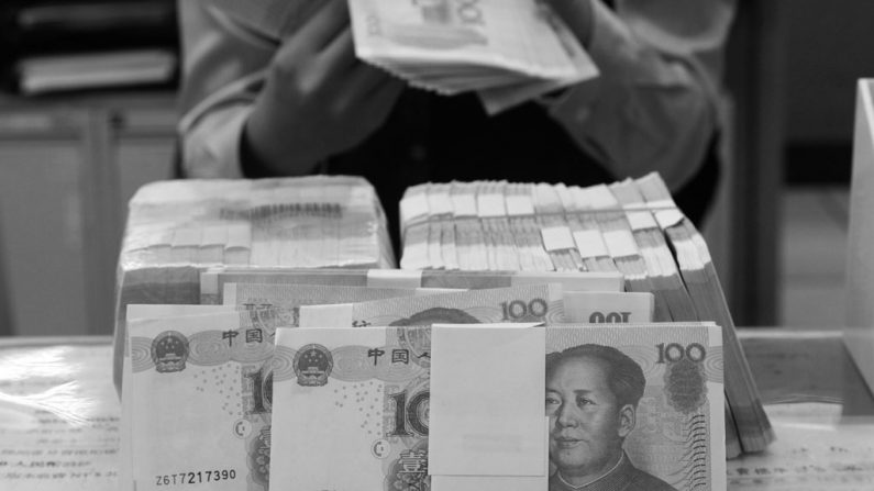 Em 16 de novembro de 2014, uma mídia estatal chinesa revelou detalhes de como funcionários compram e vendem cargos oficiais, um fenômeno da corrupção desenfreada no oficialismo chinês (Sam Yeh/AFP/Getty Images)