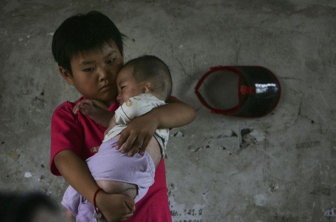 Milhões de órfãos oficiais e não oficiais são vítimas de um sistema social chinês (China Photos / Getty Images)