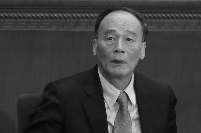 Wang Qishan, membro do Comitê Permanente do Politburo China, em 5 de Março de 2014 (Feng Li / Getty Images)