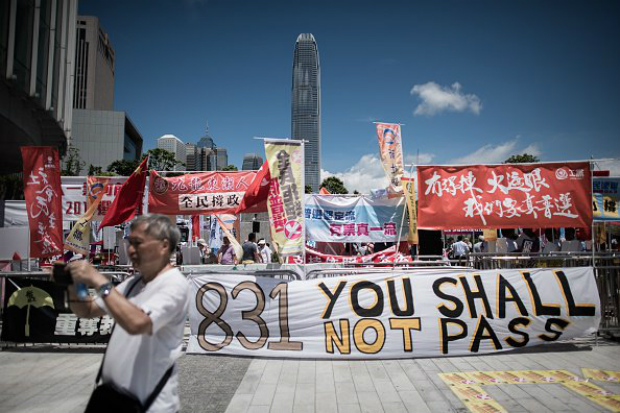 Manifestação contra projeto de lei que altera o sistema eleitoral em comparação com o Legislativo de Hong Kong (PHILIPPE LOPEZ/AFP/Getty Images)