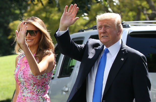 Presidente Donald Trump e sua esposa, Melania (TASOS KATOPODIS/AFP/Getty Images))