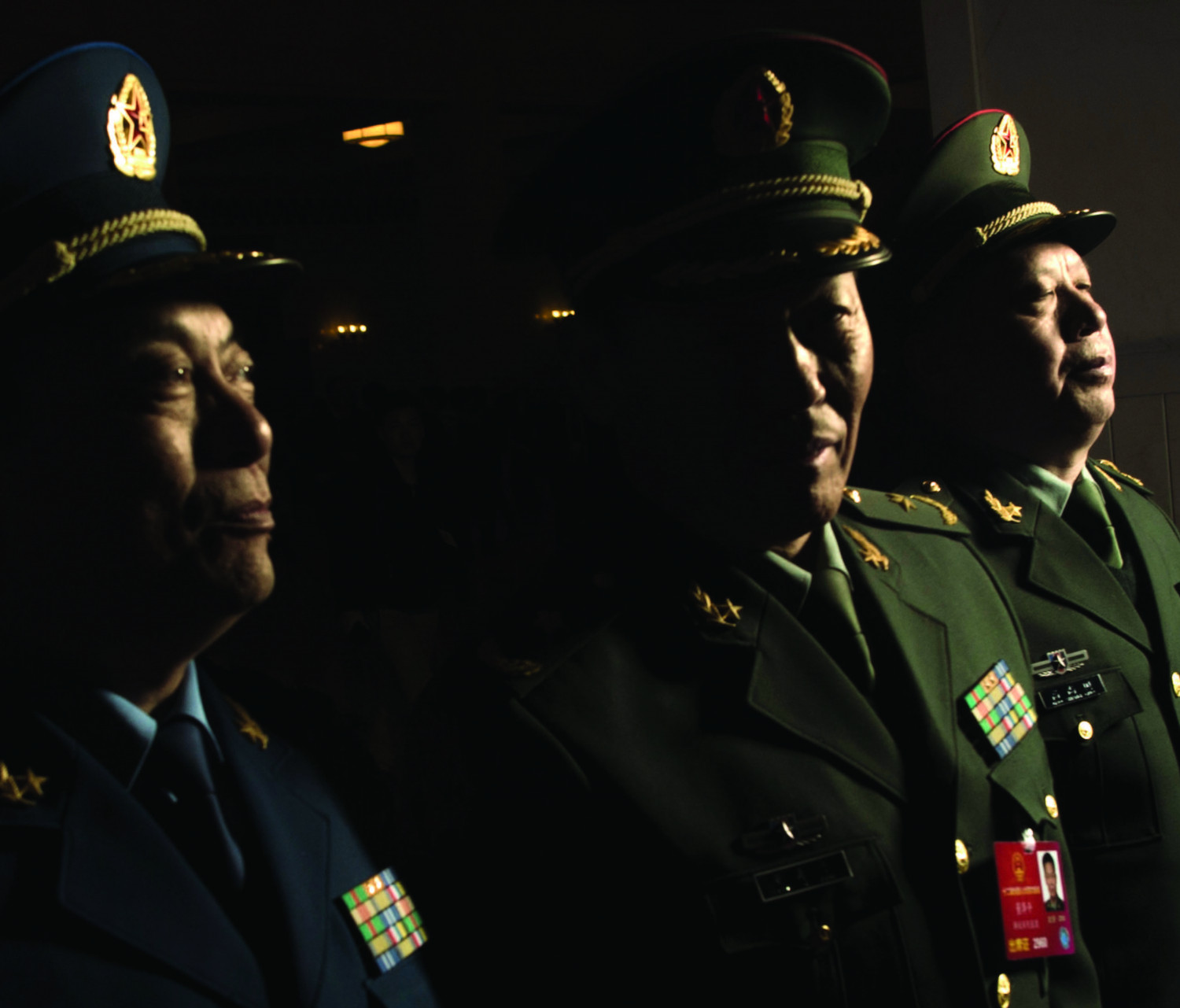 Delegados militares partem após a 2ª sessão plenária do Congresso Popular Nacional em Pequim em 9 de março de 2016 (Fred Dufour/AFP/Getty Images)