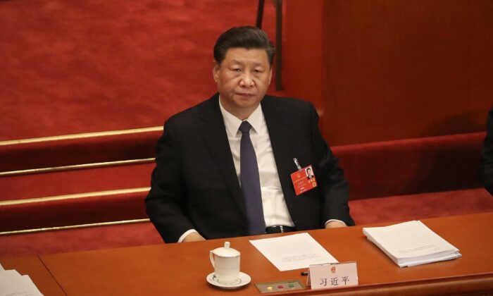 O presidente chinês, Xi Jinping, participa da abertura do Congresso Nacional do Povo no Grande Salão do Povo em Pequim, China, em 22 de maio de 2020 (Andrea Verdelli / Getty Images)