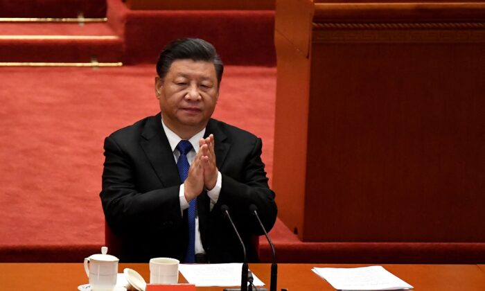 Líder do regime chinês, Xi Jinping, no Grande Salão do Povo, em Pequim, no dia 9 de outubro de 2021 (Noel Celis / AFP via Getty Images)