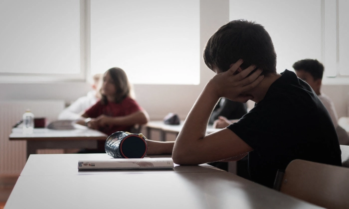 Os alunos assistem a uma aula em uma escola secundária. (Foto de arquivo Philippe Lopez / AFP via Getty Images)
