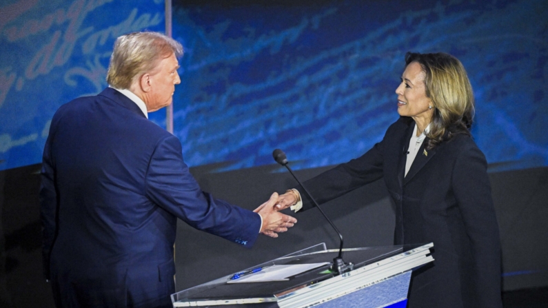 TOPSHOT - US Vice President and Democratic presidential candidate Kamala Harris (R) shakes hands with former US President and Republican presidential candidate Donald Trump during a presidential debate at the National Constitution Center in Philadelphia, Pennsylvania, on September 10, 2024. (Photo by SAUL LOEB / AFP) (Photo by SAUL LOEB/AFP via Getty Images)