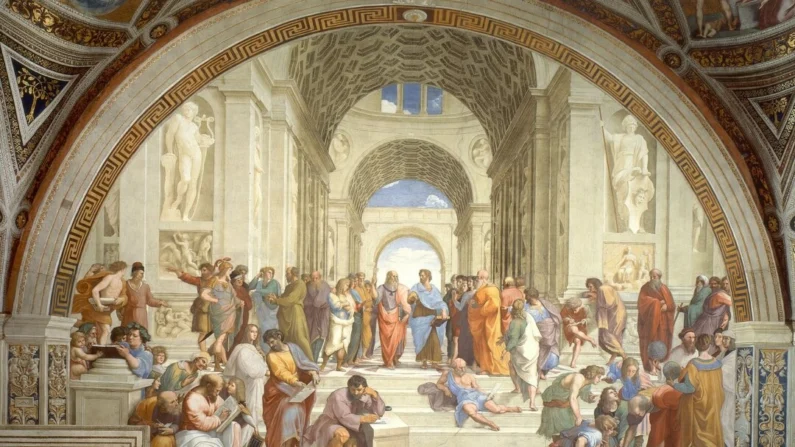 Para Pitágoras, 100 era um número “divinamente divino”. Em “The School of Athens” (A Escola de Atenas), de Raffaello Sanzio da Urbino, Pitágoras é retratado como o segundo a partir do canto inferior esquerdo, escrevendo um roteiro detalhado em um livro encadernado com uma pena. Domínio público
