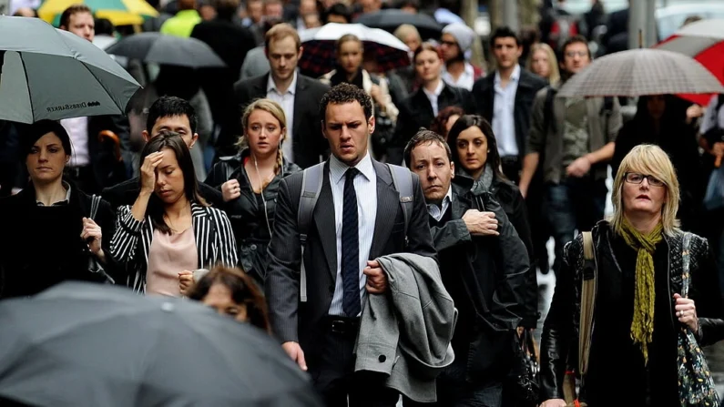 Pessoas indo para o trabalho no distrito comercial central de Sydney, na Austrália, em uma foto de arquivo. (Greg Wood/AFP via Getty Images)
